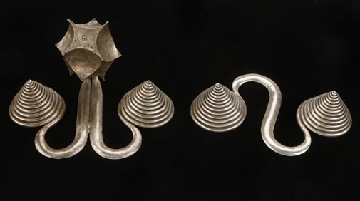 Two Antique Miao Silver Pendants, China.