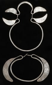 Two Antique Miao Silver Torques, China