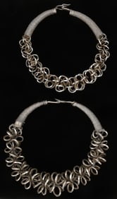 Two Antique Miao Silver Torques, China