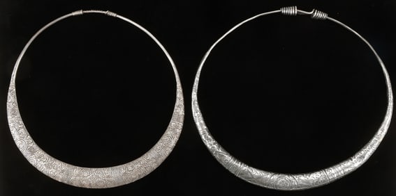 Two Antique Miao Silver Torques, China