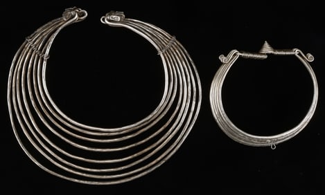 Two Antique Miao Silver Torques, China