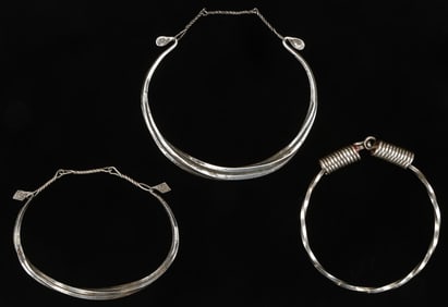 Three Antique Miao Silver Torques, China