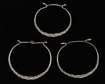 Three Antique Miao Silver Torques, China
