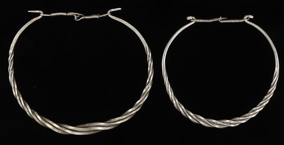 Two Antique Miao Silver Torques, China