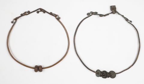 Two Antique Miao Torques, China