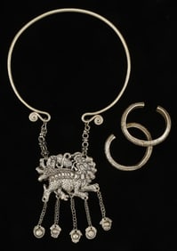 Pair of Antique Silver Jingpo Bracelets and Miao Necklace, China