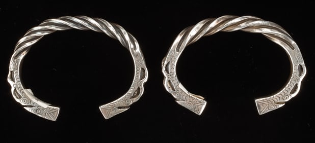 Pair of Antique Miao Silver Bracelets, China