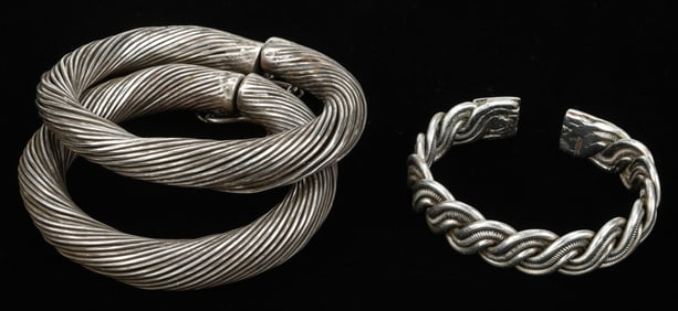Pair of Antique Unspecified Silver Bracelets and Miao Bracelet, China
