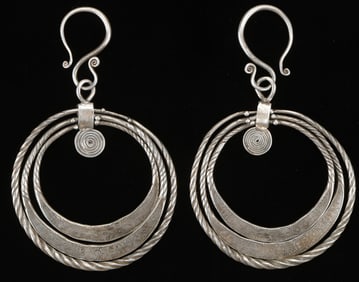 Pair of Antique Miao Silver Earrings, China