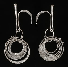Pair of Antique Miao Silver Earrings, China