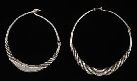 Two Antique Dong Silver Torques, China