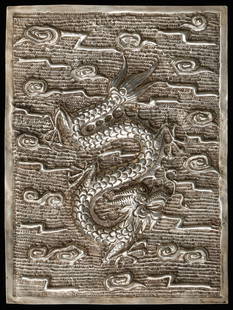 Antique Silver Plaque, China: Antique Silver Plaque, China. Rectangular silver plaque with decoration in repousse of a dragon and cloud design. Weight: 61 g. Size: 5'' x 6.5'' x '' (13 x 17 x cm). Provenance: Ex. Roger Hollander c