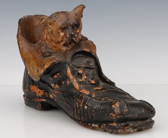 Antique Ceramic Dog In A Shoe Sculpture