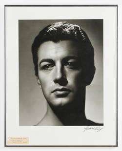 George Hurrell (1904-1992) Portrait of Robert Taylor, 1936: George Hurrell (American, 1904-1992) Portrait of Robert Taylor (1936), silver gelatin photograph, signed. Framed. Size: 15'' x 12'', 38 x 30 cm (image); 20.25'' x 16.25'', 51 x 41 cm (frame). Provenan