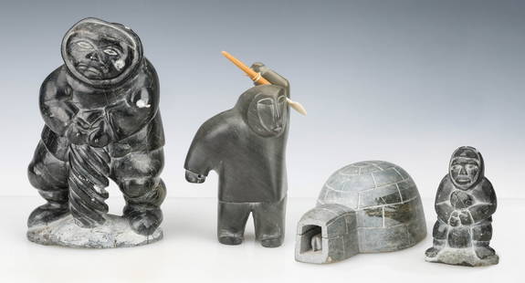 2 Inuit Carved Stone Figures: 2 Inuit Carved Stone Figures. Sizes: 1) 7'' x 4'' x 2.5'' (18 x 10 x 6 cm); 2) 9.5'' x 5.5'' x 4.5'' (24 x 14 x 11 cm). Together with igloo and figure. Provenance: Collection of Dr. and Mrs. Albert an