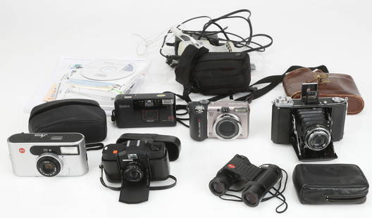 5 Vintage Cameras and 1 Pair of Binoculars: Vintage Camera Collector's Lot. Including: Canon Power Shot A650 IS; Konica A4; Minox 35 GL; C1 Leica Camera Vario-Elmar 38-105 ASPH; Leitz Trinovid binoculars; Zeiss Ikon Anastimat 75cm.