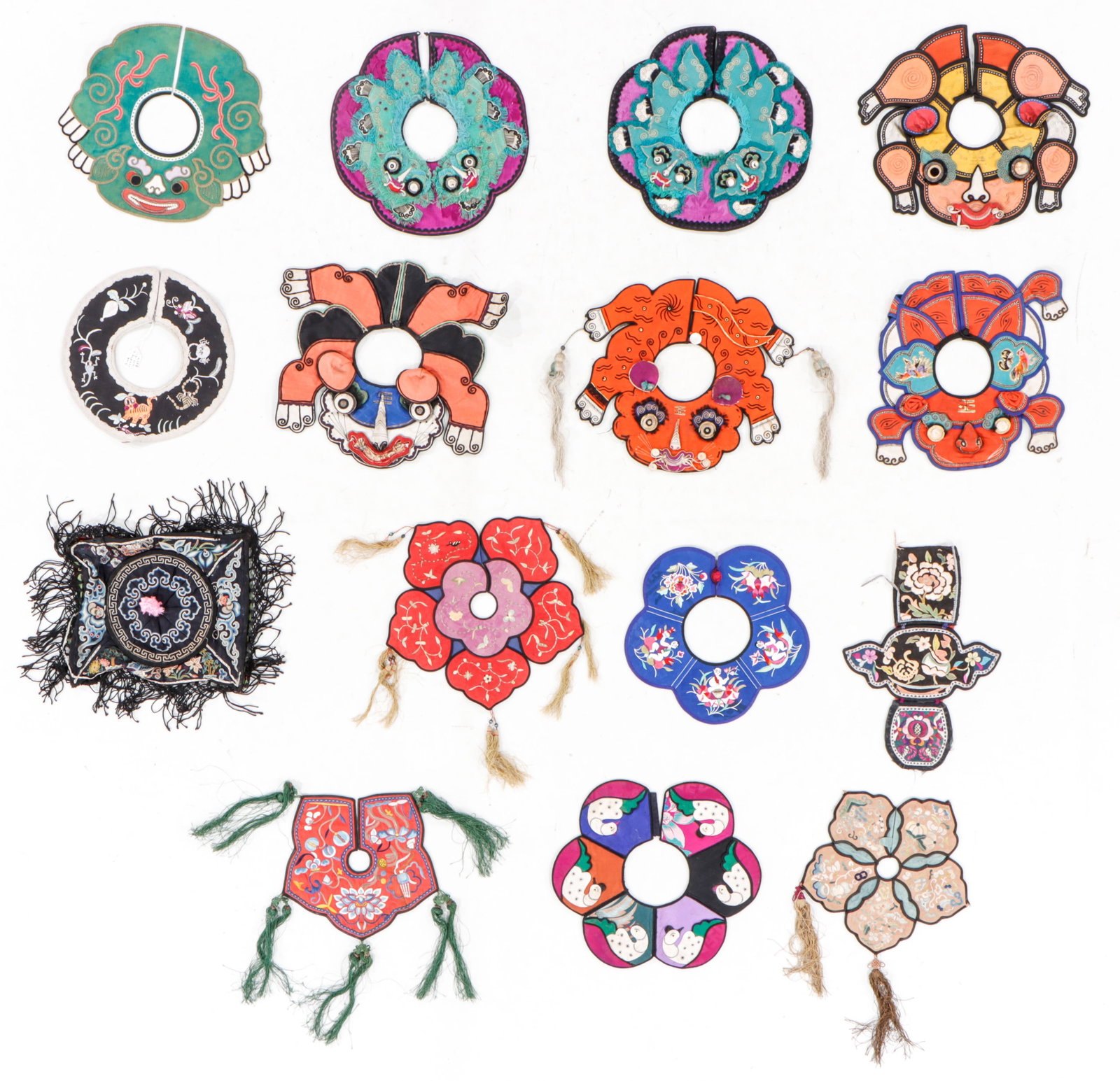 15 Chinese Silk Embroidered Child's Collars: 15 Chinese Silk Embroidered Child's Collars. Silk embroidery on silk with tassels. Sizes Ranging From: 8'' x 7'' (20 x 18 cm); To: 1'0'' x 11'' (30 x 28 cm). Provenance: Collection of Brooke and Dov J