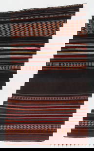 Quechua Woman's Aksu Skirt, Macha, Dept. of Potosi, c. 1900-1950: Quechua Woman's Aksu Skirt, Macha, Dept. of Potosi, c. 1900-1950. Wool. A highly decorated woman’s festival and wedding skirt of the Macha tribe. This densely striped and patterned two panel weaving