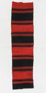 Wool Flatwoven Rug, possibly Andean, 1'6'' x 6'4'': Wool Flatwoven Rug, possibly Andean. Tapestry woven panel of broad, dark blue striping on a red ground. Three selvages are present with the right end cut eliminating an unknown sized piece of cloth. T
