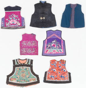 7 Chinese Silk Embroidered Child's Vests and Panels, Early 20th C.: 7 Chinese Silk Embroidered Child's Vests and Panels, Early 20th C. Silk, metal buttons. Sizes Ranging From: 0'10.5'' x 1'1'' (27 x 33 cm); To: 1'9'' x 1'4'' (53 x 41 cm). Provenance: Collection of Bro
