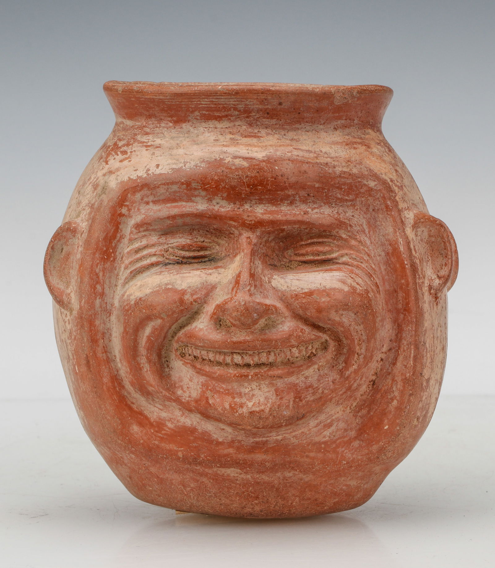 Face Urn, Chimu to Colonial Culture, C. 1470-1600.: Face Urn, Chimu to Colonial Culture, C. 1470-1600. Size: 5.5'' x 5'' x 5'' (14 x 13 x 13 cm).