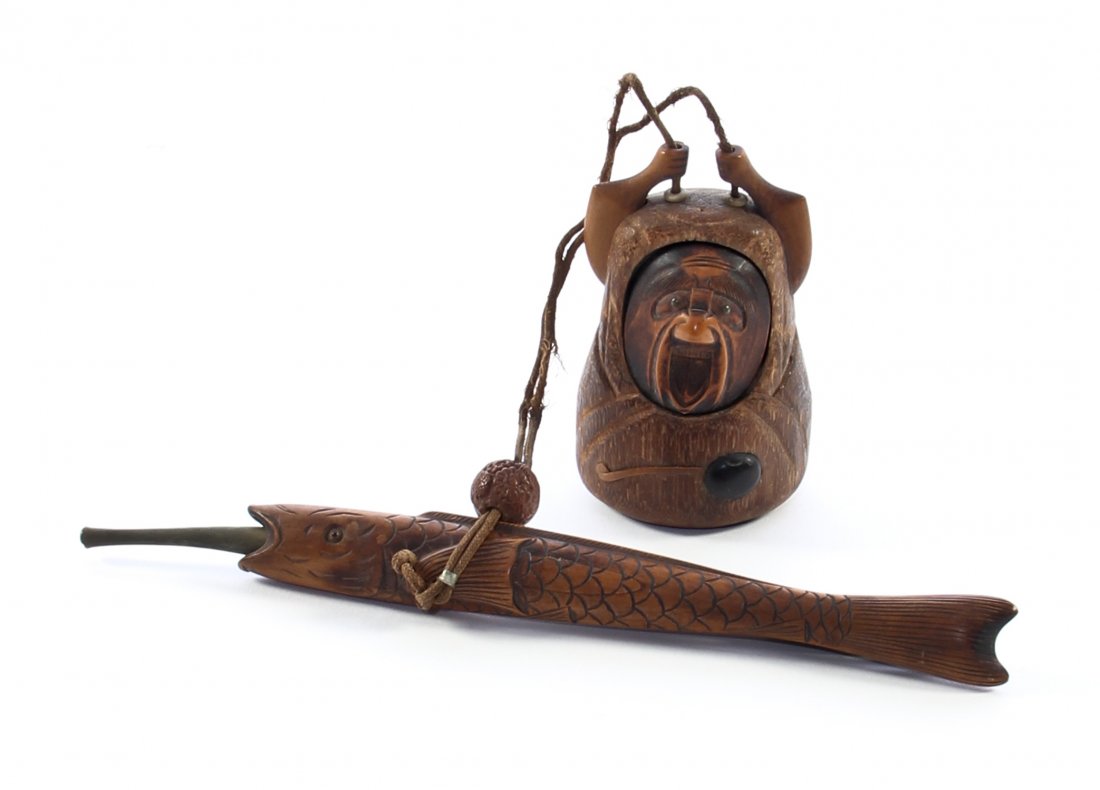 Meiji Period Figural Kiseruzutsu with Pendant Daruma To: Japanese pipe (Kiseru) case in figural carved sheath (Kiseruzutsu) in the shape of a fish and pendant figural (Daruma)tobacco box (Tonkotsu) in mixed woods, bamboo, fruitwood, and boxwood. Featuring b
