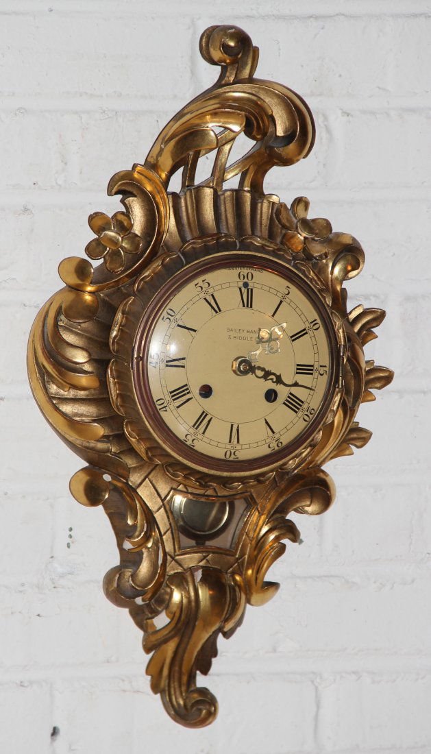 Rococo Style Giltwood Wall Clock: Rococo Style Giltwood Wall Clock. Originally made for Bailey Banks & Biddle Co. Marked on transverse "Gotene, Ljungstroms Uriodalaabrik, Made in Sweden. Original movement replaced with quartz movement