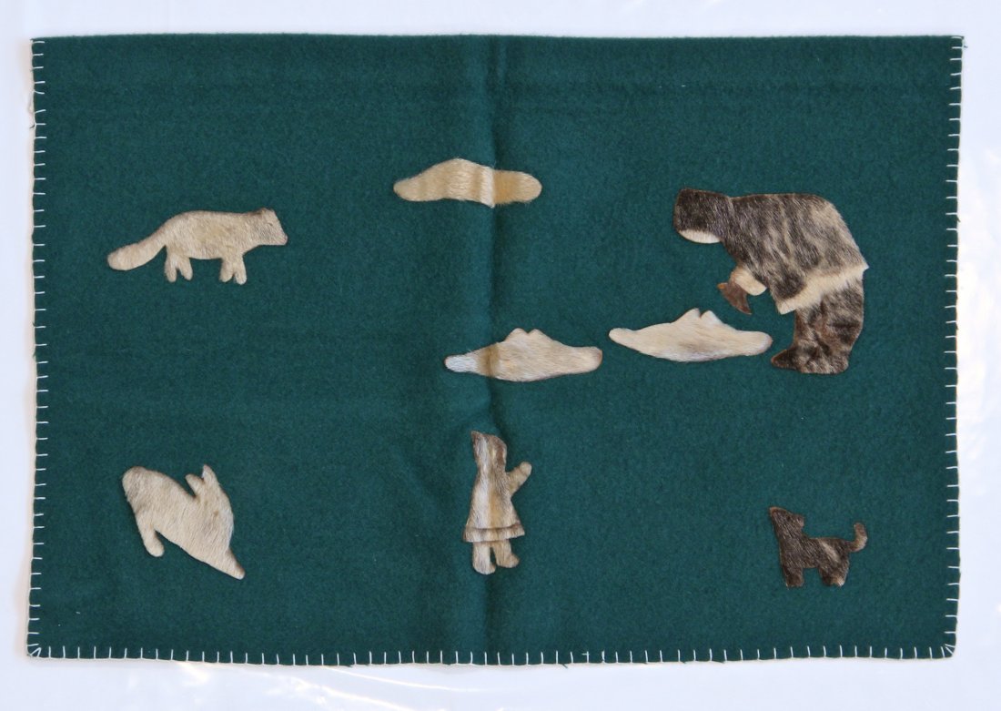 Vintage Inuit Blanket: Inuit Blanket, 20th c, green wool with sealskin applique. Size: 2'11" x 2'0" (89 x 60 cm). Provenance: a Gentleman in California.