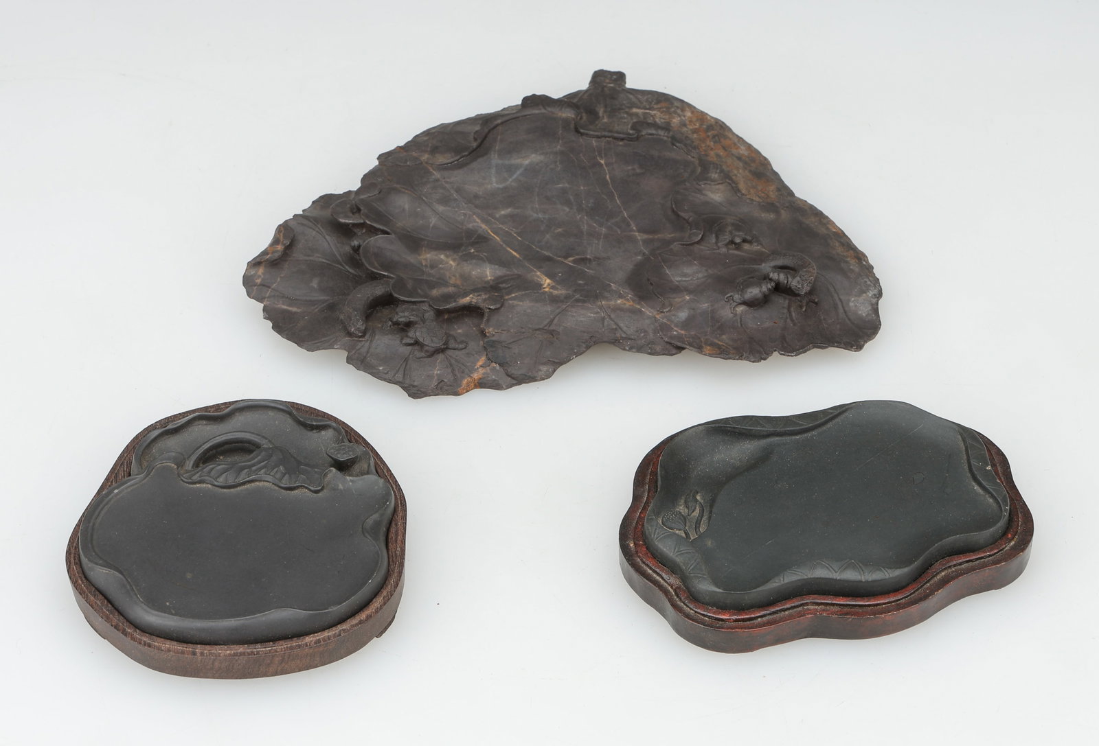 3 Chinese Ink Stones, Republic Period: 3 Chinese Ink Stones, Republic Period. Size from: .5'' x 5'' x 4.5'' (1 x 13 x 11 cm) to .5'' x 9.5'' x 6.5'' (1 x 24 x 17 cm). Provenance: Private Philadelphia Estate Collection.