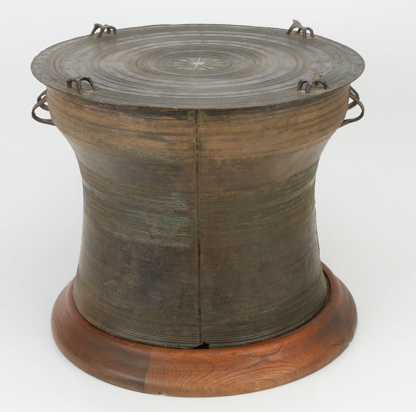 Chinese Shan Bronze Rain Drum: Chinese Shan Bronze Rain Drum. With two pairs of loop handles, decorated with thin bands of shallow geometric patterns in shallow relief, the top with similar concentric circle bands centering a star