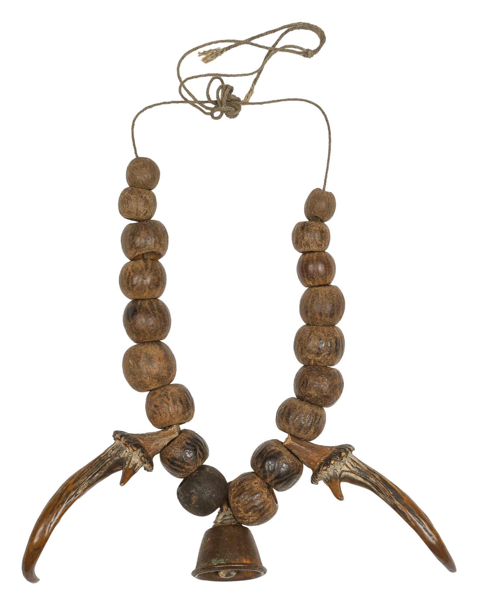 Antique Hornbead Necklace: Antique Necklace. Necklace of horn beads and pendants, one copper or brass bell. Size: 9'' x 9.5'' (23 x 24 cm). Provenance: Ex. Roger Hollander collection.