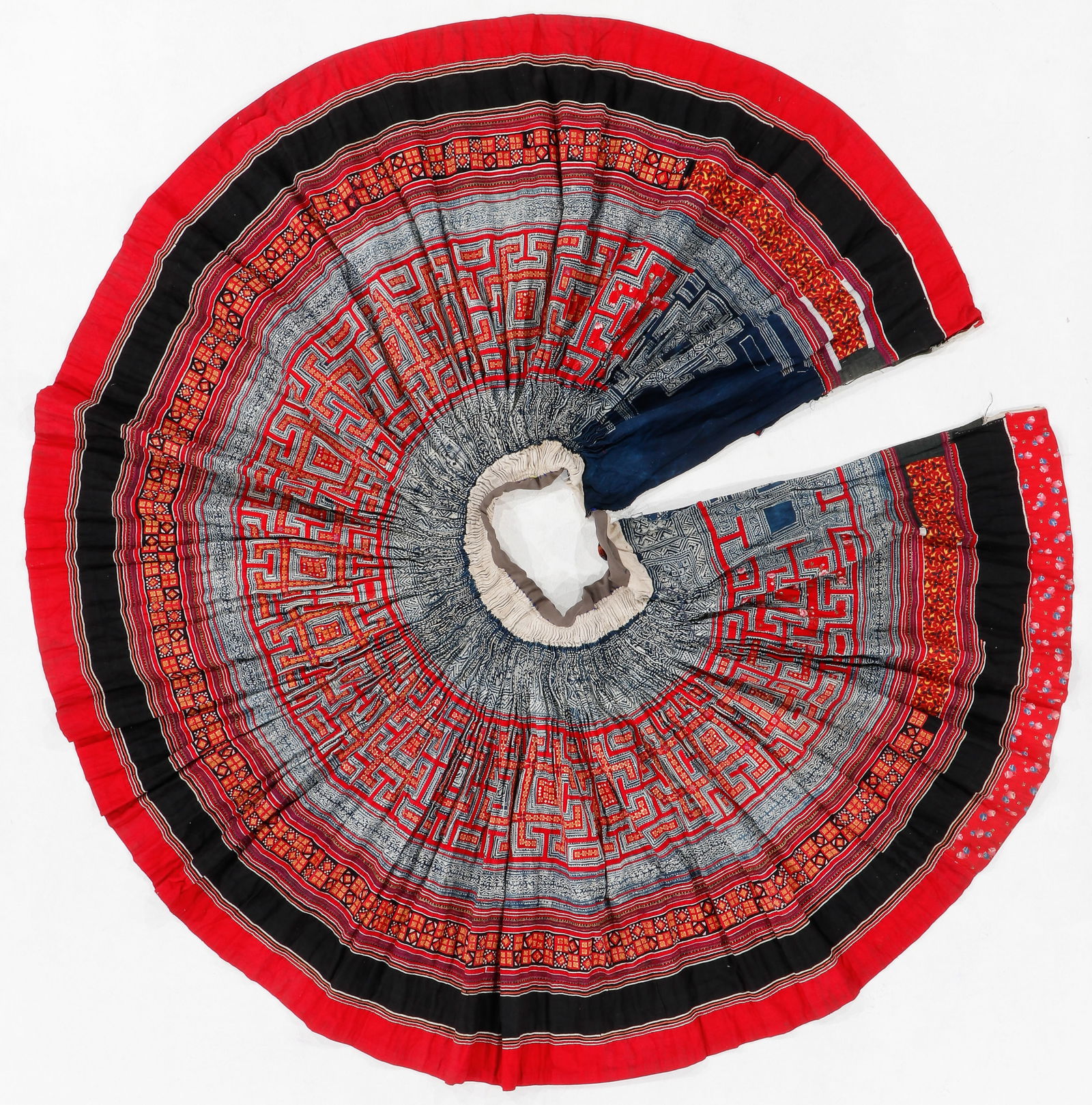 Miao Batik and Applique Pleated Wrap Skirt, South China/Northern Thailand, Mid 20th C.: Miao Batik and Applique Pleated Wrap Skirt, South China/Northern Thailand, Mid 20th C. Cotton skirt with batik, embroidery and applique. 2'9'' x 2'2'' (84 x 66 cm)