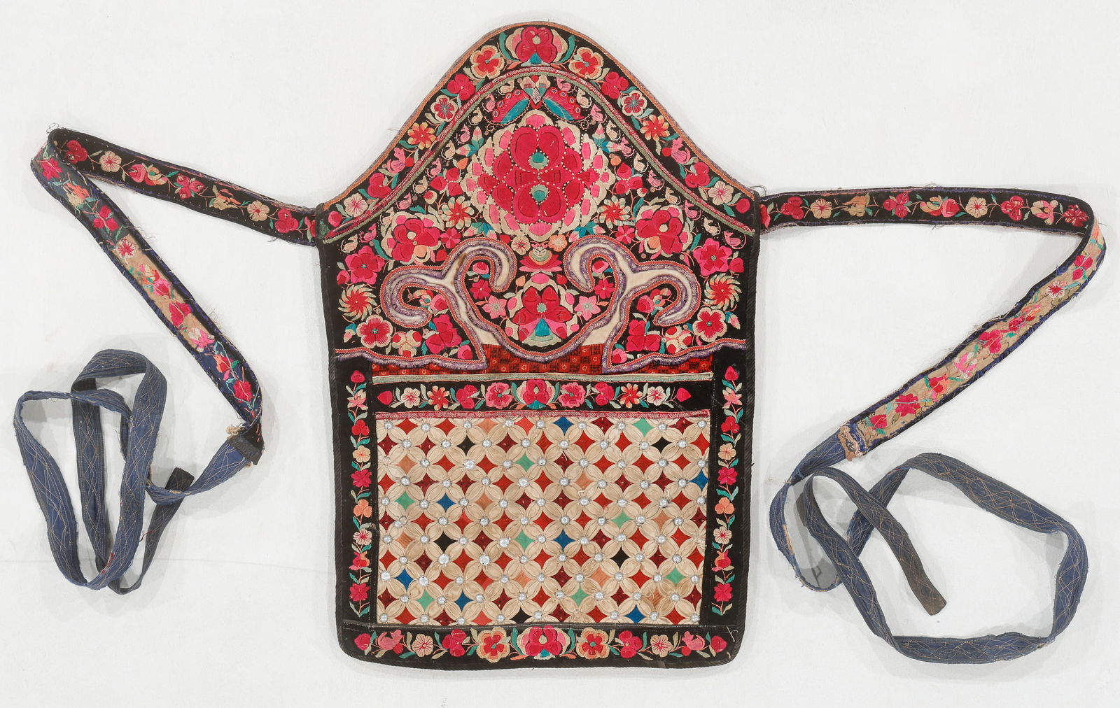 Antique Miao Quilted and Embroidered Baby Carrier, Yunnan, China: Antique Miao Quilted and Embroidered Baby Carrier, Yunnan, China. Cotton with embroidery, half sphere metal studs, and quilting. Panel Size: 1'6'' x 2'1'' (46 x 64 cm).