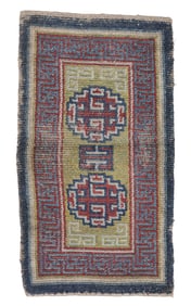 Warp Face Back Double Medallion Rug, Tibet, 19th C., 2'1'' x 3'10''