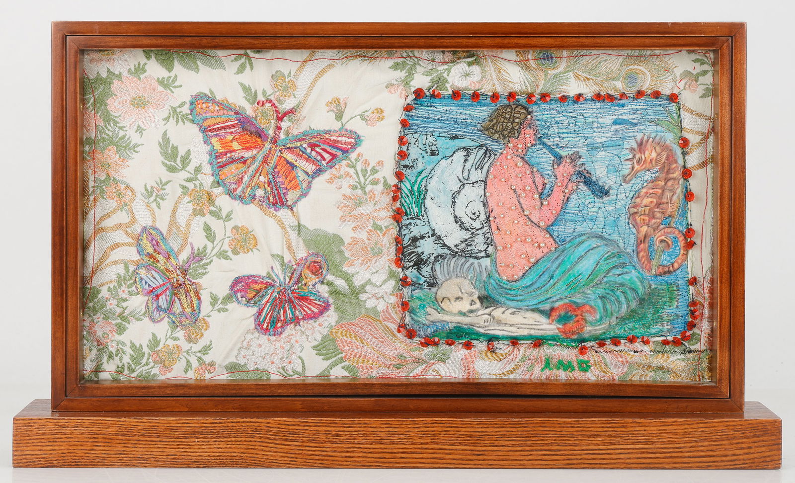 Anne Marie Grgich (American) Folk Art Embroidery: Anne Marie Grgich (American, b. 1961) Untitled (Mermaid and Butterflies) Mounted Double-Sided Collage, mixed media, embroidered signature. Framed. Size: 13'' x 22'' x 4'' (33 x 56 x 10 cm). A featured