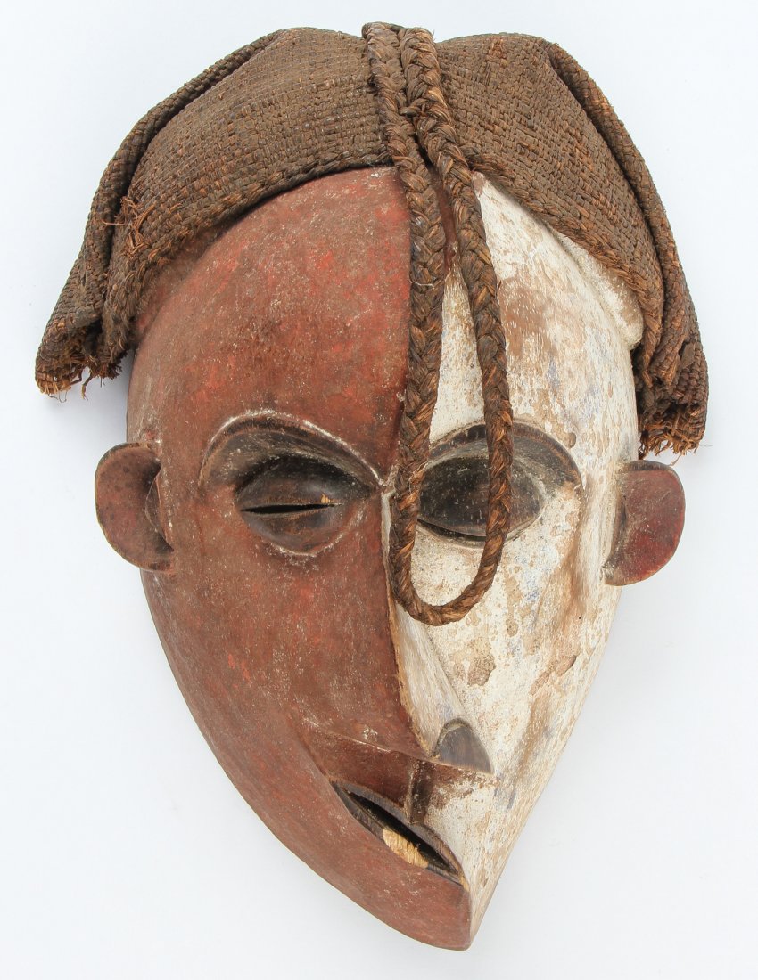 African Pende Mbangu Mask: African Pende Mbangu (Sickness) Mask. Carved wood, fiber fabric. Size: 11" x 7" x 6.5". Provenance: Max Garb, Chicago, Illinois.