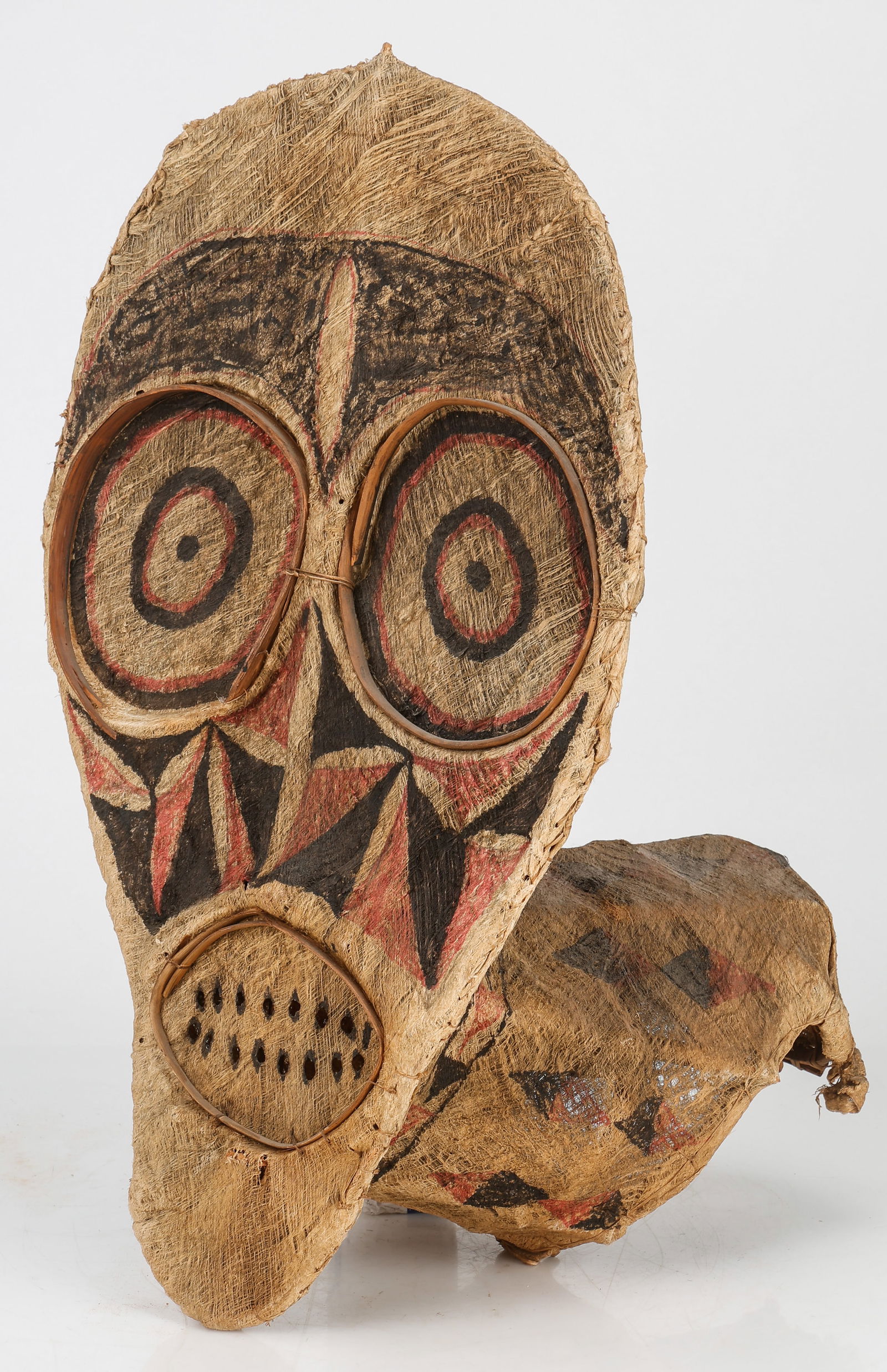 Kavat (Mask), Kaitak / Urumot Baining People, Papua New Guinea: Kavat (Mask), Kaitak / Urumot Baining People, Papua New Guinea. Rattan, barkcloth, and paint. Size: 27'' x 15'' x 15'' (69 x 38 x 38 cm). Provenance: Property from the Estate of Pulitzer Prize-winning