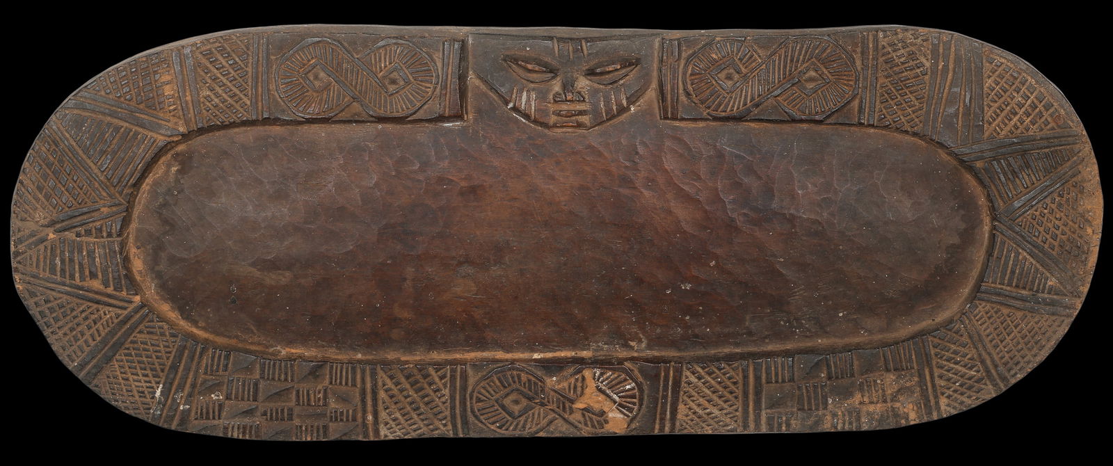 Ifa Divination Board, Yoruba: Ifa Divination Board, Yoruba. Size: 22'' x 8.5'' x 1'' (56 x 22 x 3 cm). Provenance: ex Sidney and Gae Berman Collection.