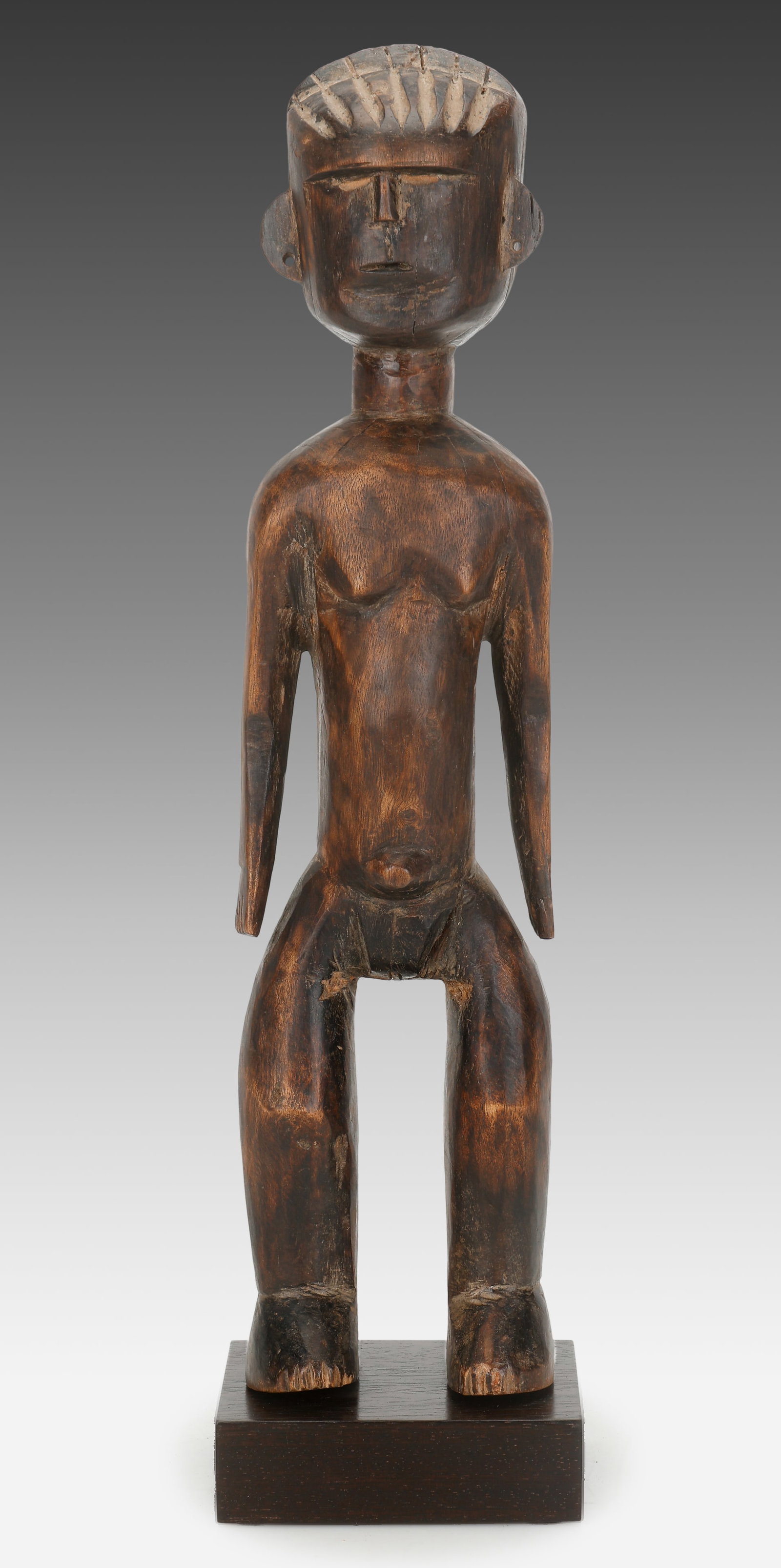 Vere Figure, Nigeria: Vere Figure, Nigeria. On stand. Size: 16.5'' x 4'' x 3'' (42 x 10 x 8 cm). For related works see: Chappel (Tim), Richard Fardon & Klaus Piepel, "Surviving Works: Context in Verre Arts - Part Two, Chap