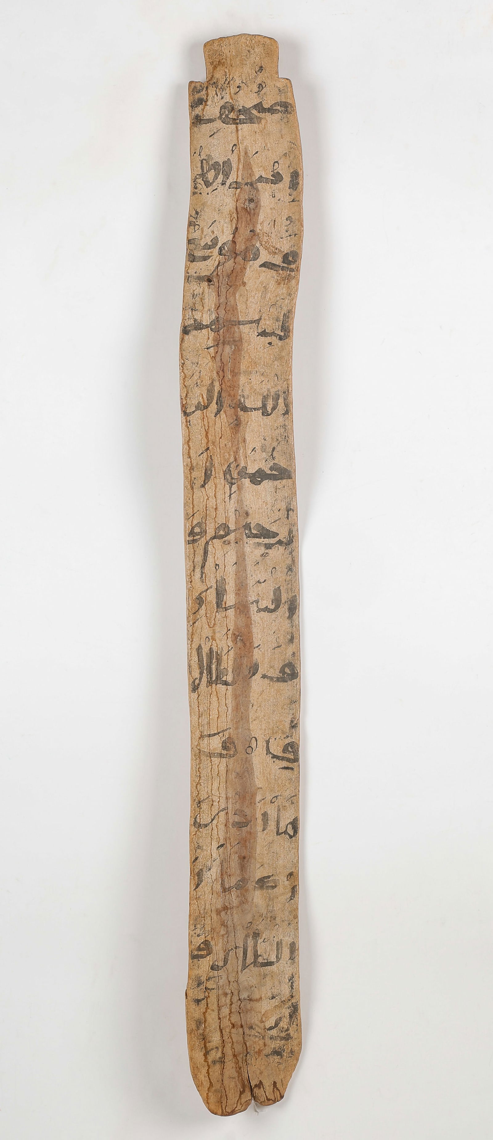 Koranic Tablet For Students of a Madrassa, Somali and Related Peoples: Koranic Tablet For Students Of A Madrassa, Somali and Related Peoples, Somali and Related Peoples. Carved wood and pigment. Size: 53'' x 6'' x .5'' (135 x 15 x 1 cm). Provenance: Property from the Est