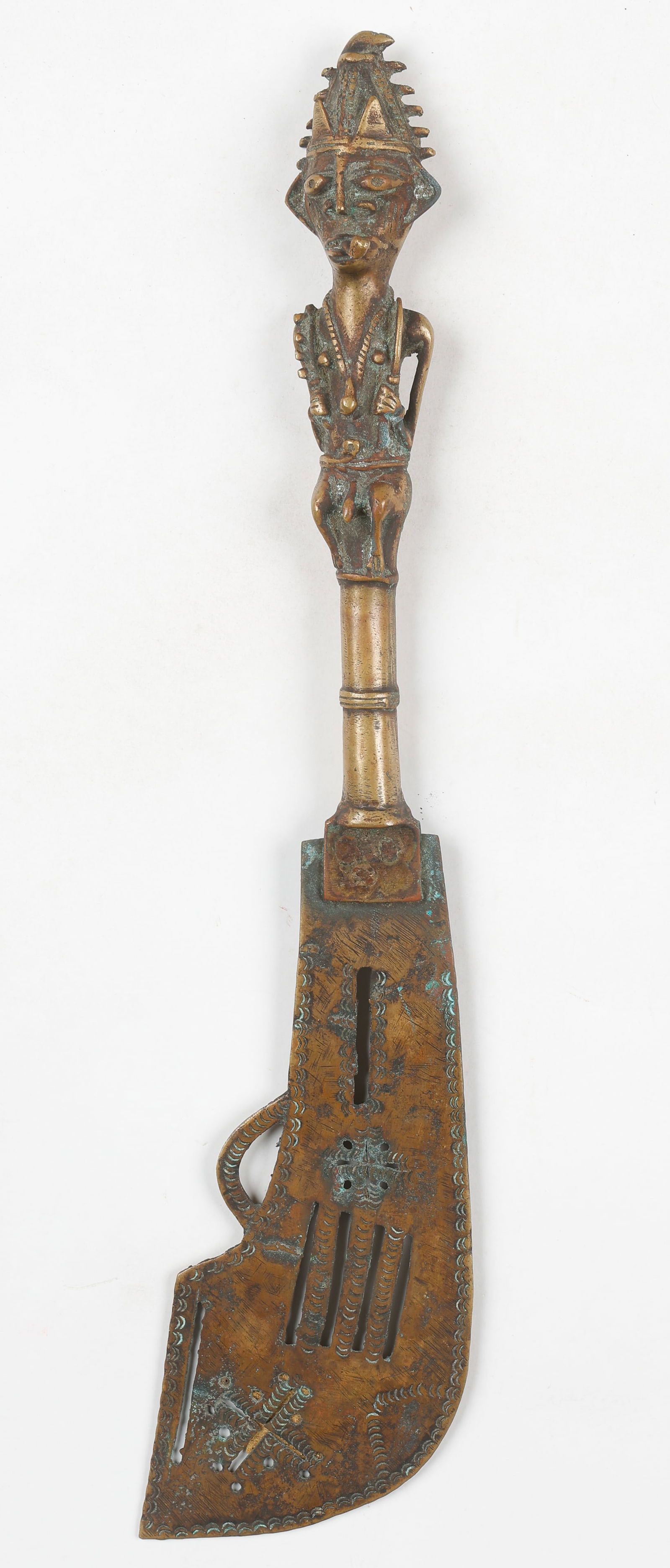 Yoruba Lost Wax Cast Copper Ritual Sword (Ada Ogun), Nigeria: Yoruba Lost Wax Cast Copper Ritual Sword (Ada Ogun), Nigeria. The handle in the form of a dignitary, possibly an Ogun priest. Length: 18" (46 cm). Provenance: From the Collection of Richard Kempshall