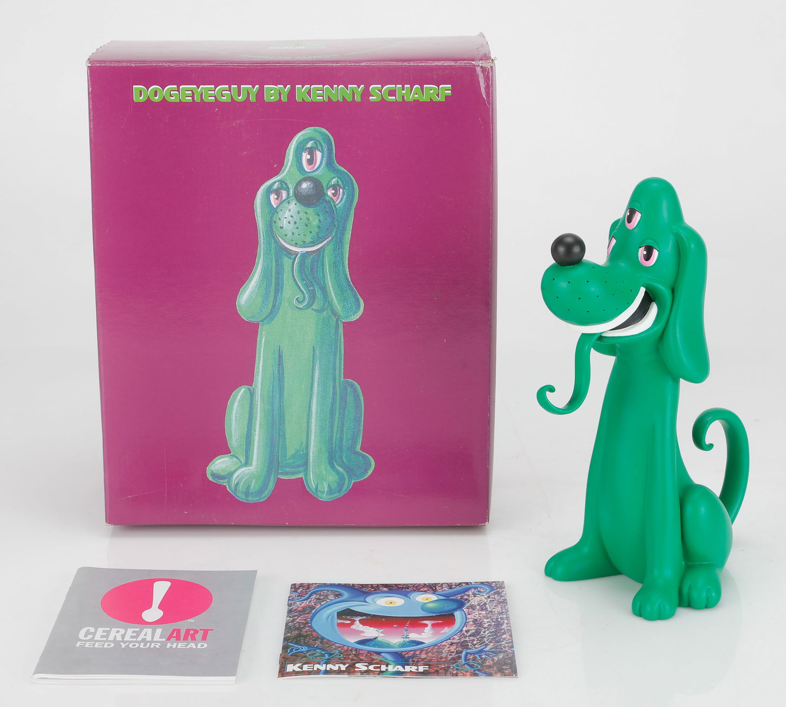 Kenny Scharf (American, b. 1958) "Dogeyeguy," 2004: Kenny Scharf (American, b. 1958) "Dogeyeguy," 2004, painted resin dog sculpture, in original box. Limited edition of 2500 in collaboration with Cereal Art. Stamped signature at the bottom. Size: 10''