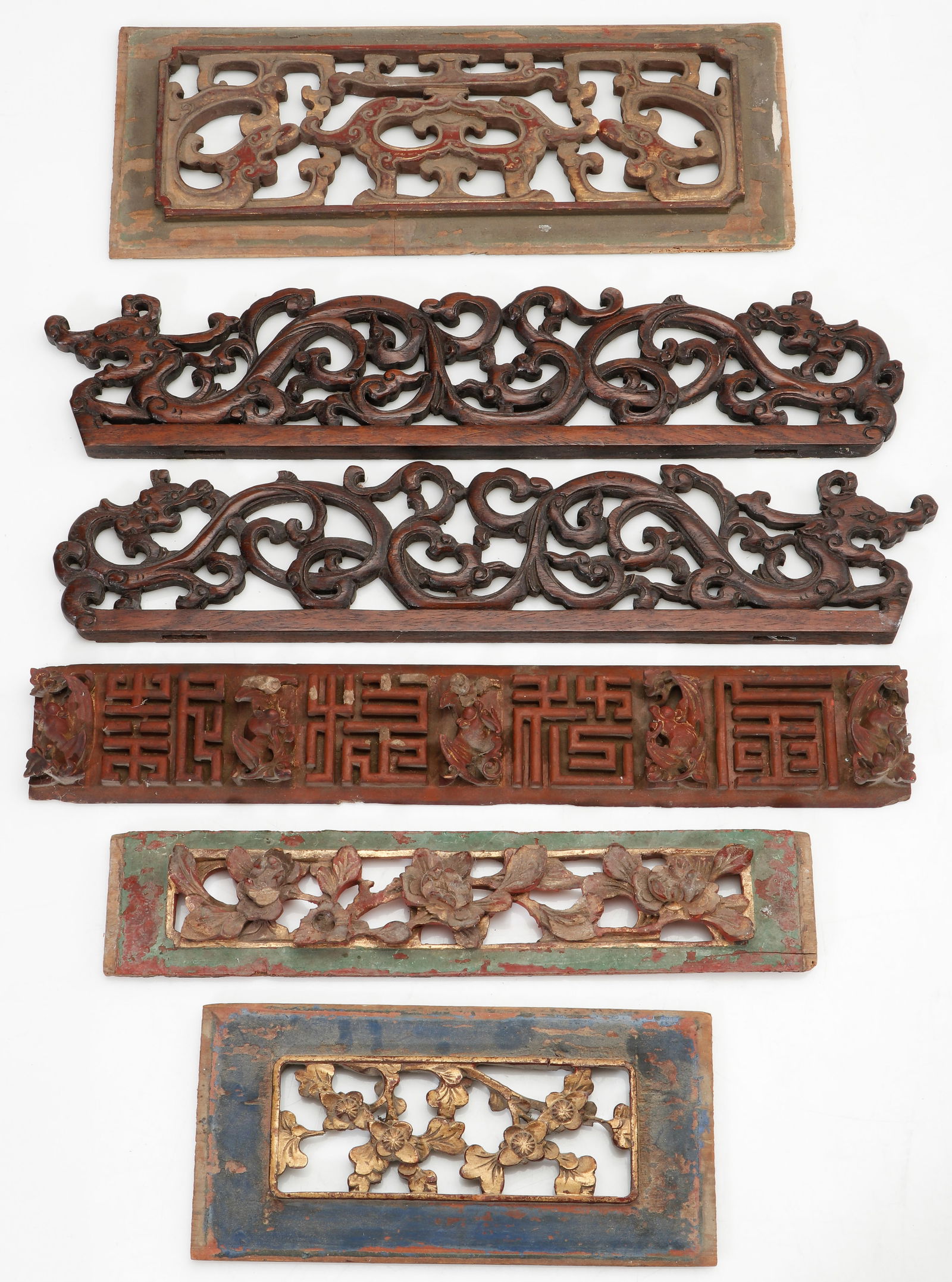 Group of Six Chinese Carved Wood Panels: Group of Six Chinese Carved Wood Panels. Sizes From: 4.5'' x 9.5'' (11 x 24 cm); To: 5.5'' x 14.5'' (14 x 37 cm). Provenance: Private Philadelphia Estate Collection.