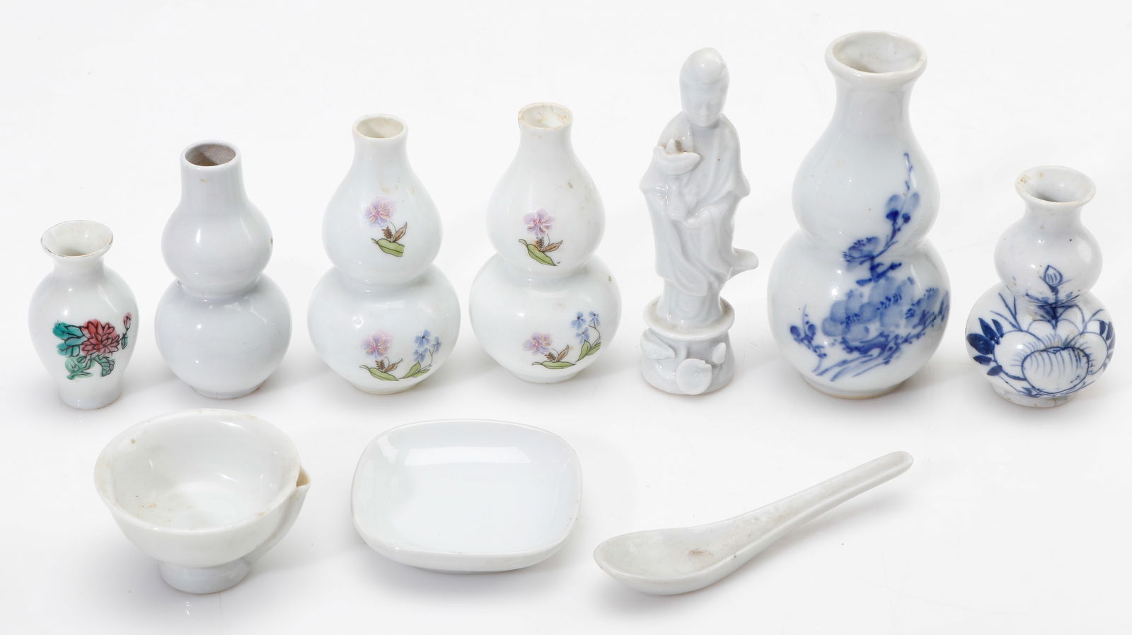 Group of Ten Chinese Ceramic Objects: Group of Ten Chinese Ceramic Objects. Sizes From: 2'' x .5'' x 1'' (5 x 1 x 3 cm); To: 4.5'' x 2'' x 2'' (11 x 5 x 5 cm). Provenance: Private Philadelphia Estate Collection.