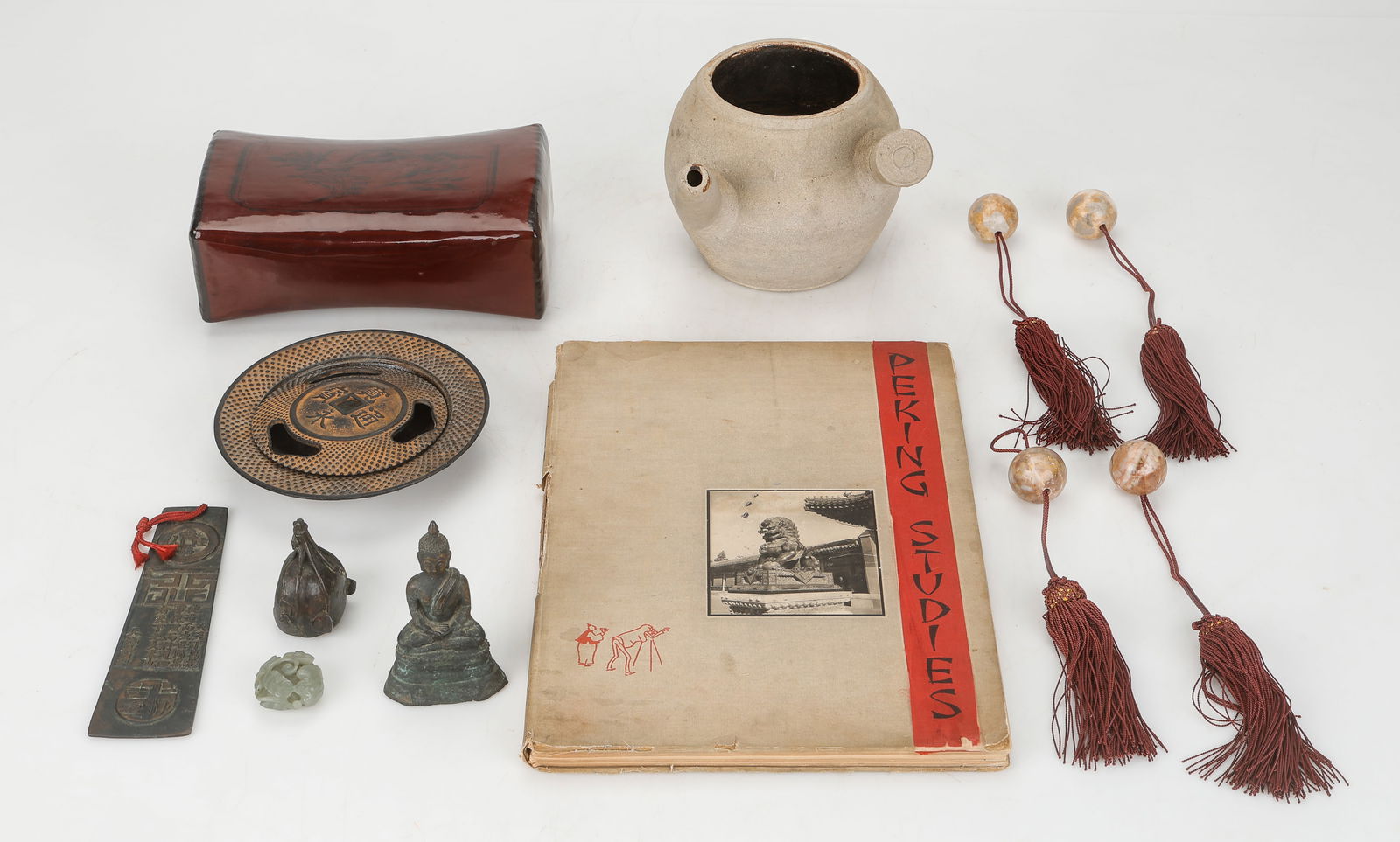 Collector's Lot of 12 Vintage Chinese Objects: Collector's Lot of 12 Vintage Chinese Objects. Includes four scroll weights, a bronze incense burner, a bronze plaque with characters, a small green hardstone carving, a lacquered wood pillow, a teapo