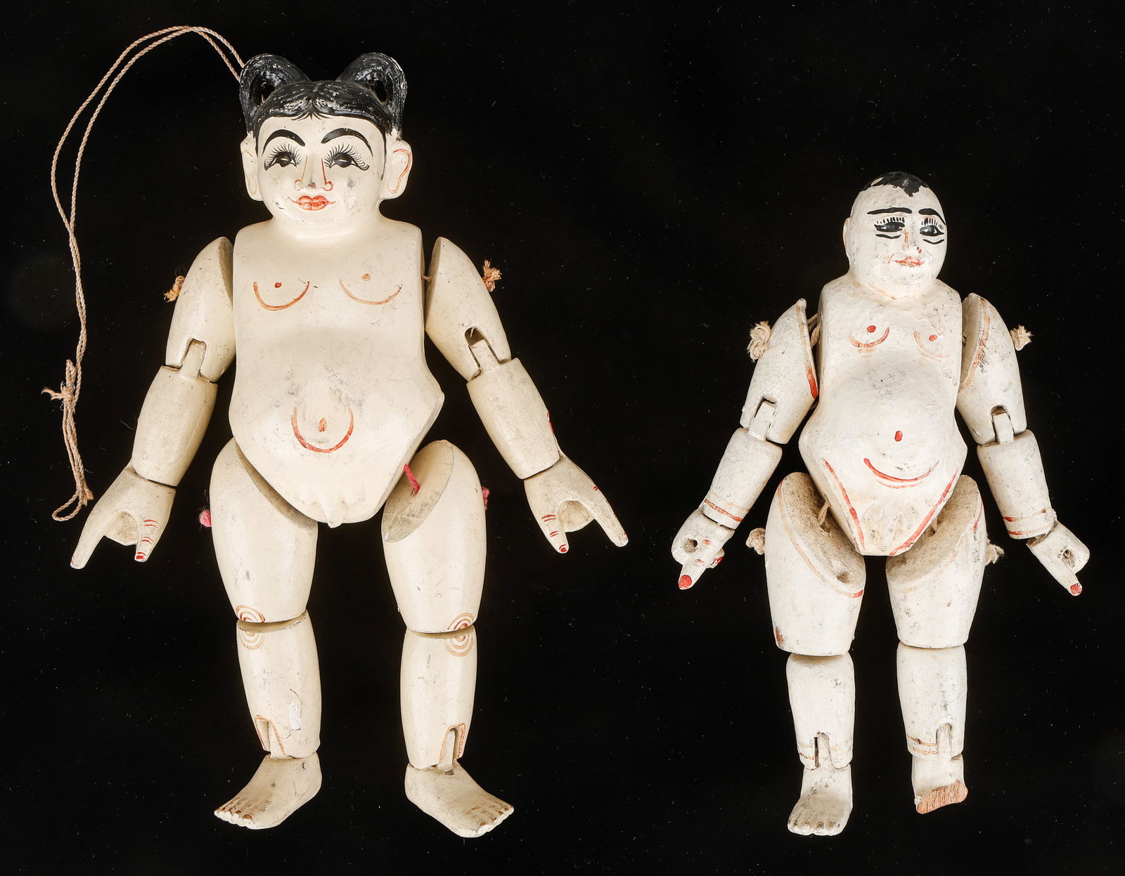 2 Vintage Burmese Wooden Articulated Dolls, Myanmar: 2 Vintage Burmese Wooden Articulated Dolls, Myanmar. Wood, paint. Lengths From: 8.75" (22 cm); To: 10" (25 cm).