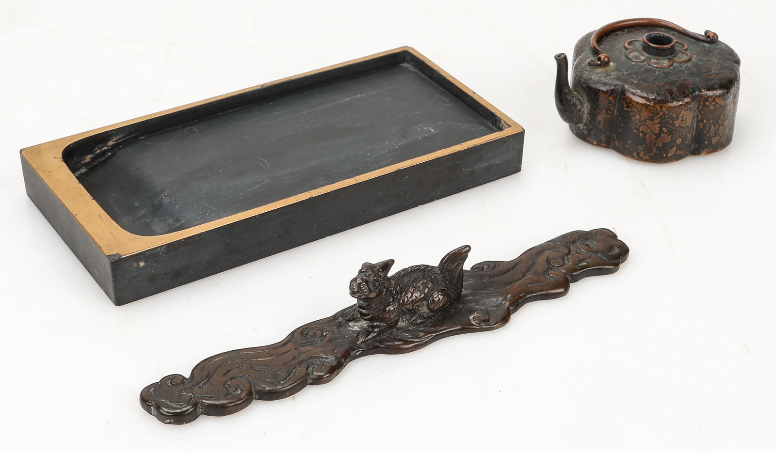 3 Antique/Vintage Japanese Writing Desk Articles: 3 Antique/Vintage Japanese Writing Desk Articles. Includes iron brush rest, small bronze ink pot, and ink stone. Enclosed in wooden box. Size: 2.5'' x 11.5'' x 7'' (6 x 29 x 18 cm) (box).