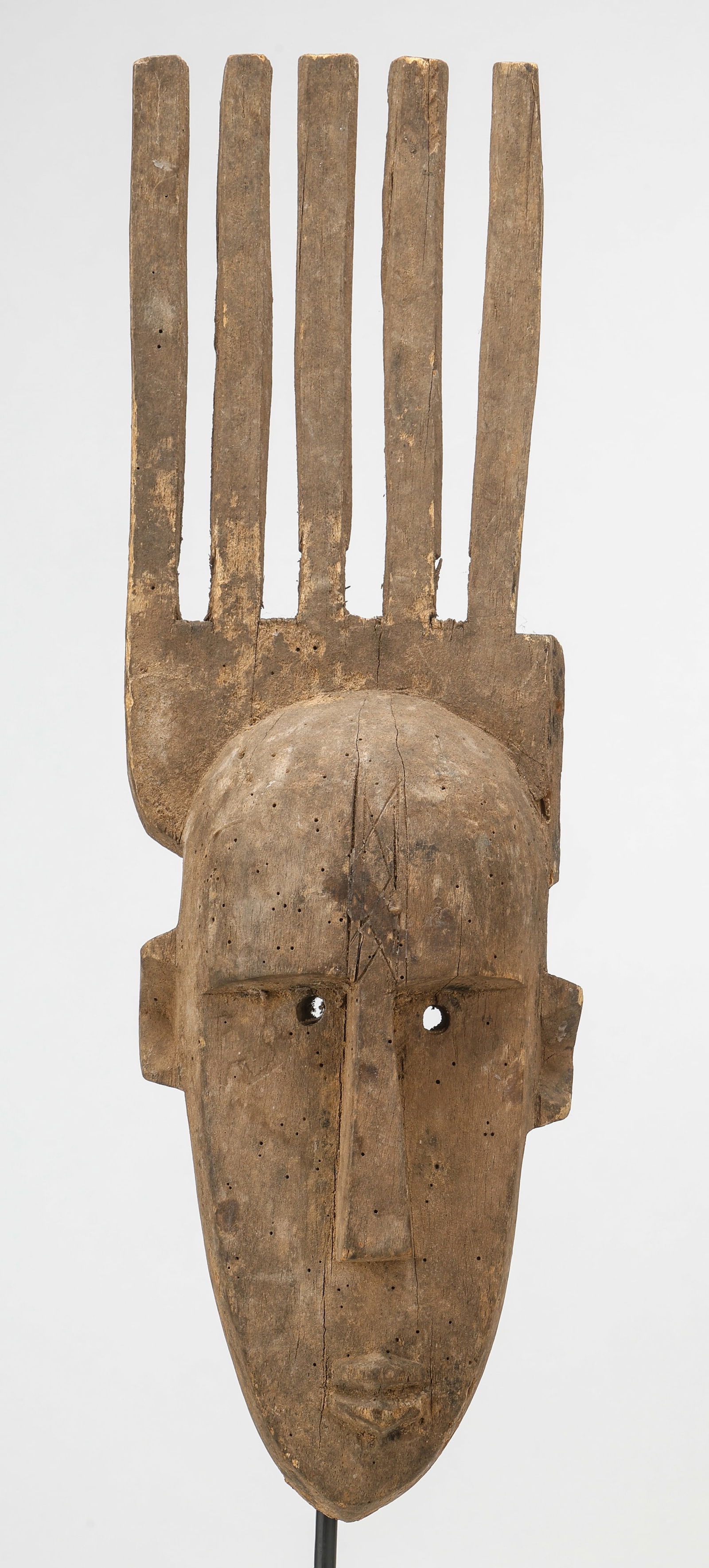 African Bamana Ntomo Mask, Mali: African Bamana Ntomo Mask, Mali. Wood. Stand not included. Size: 16'' x 5.5'' x 3'' (41 x 14 x 8 cm).