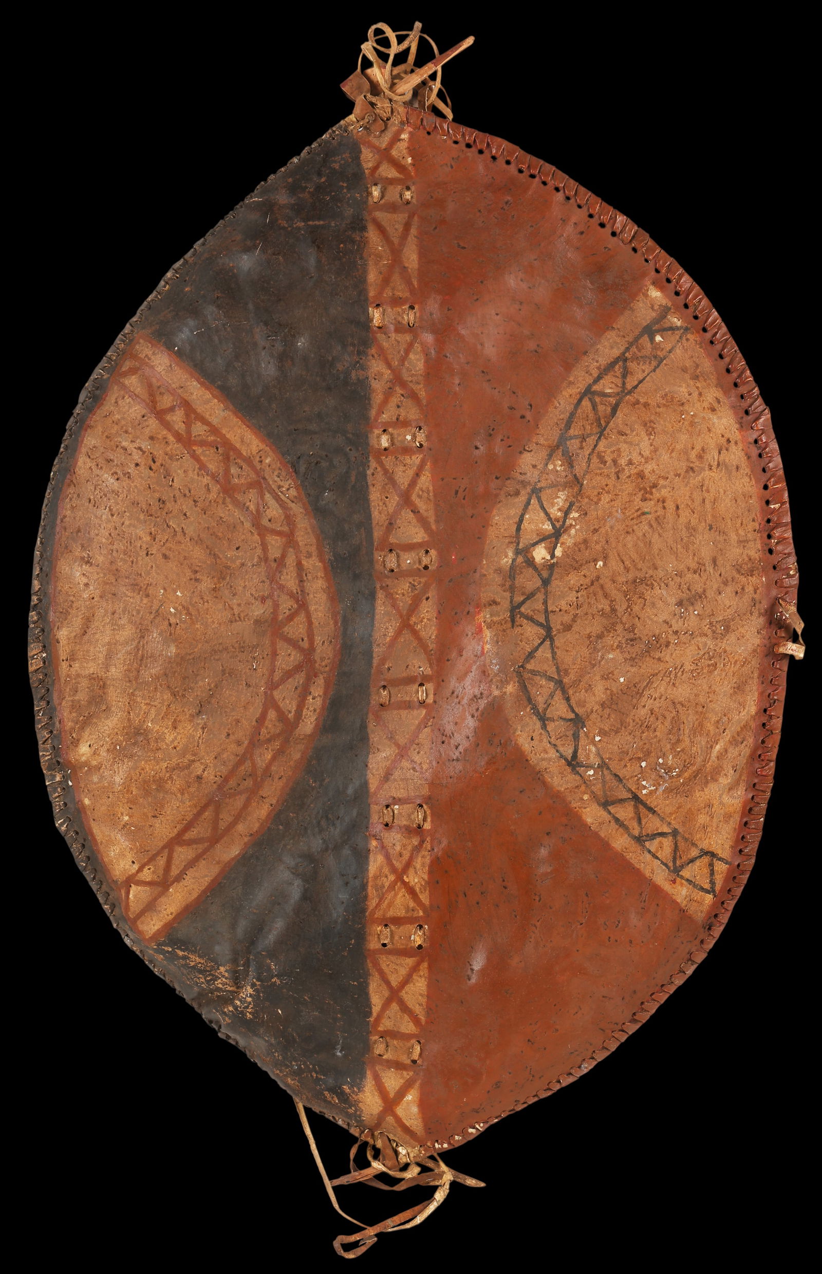 African Maasai Style Shield, Kenya, ex Edward F. Albee: African Maasai Style Shield, Kenya. Size: 39.5'' x 27'' (100 x 69 cm). Leather, wood, pigment, plant fiber. Provenance: Property from the Estate of Pulitzer Prize-winning American playwright Edward F.