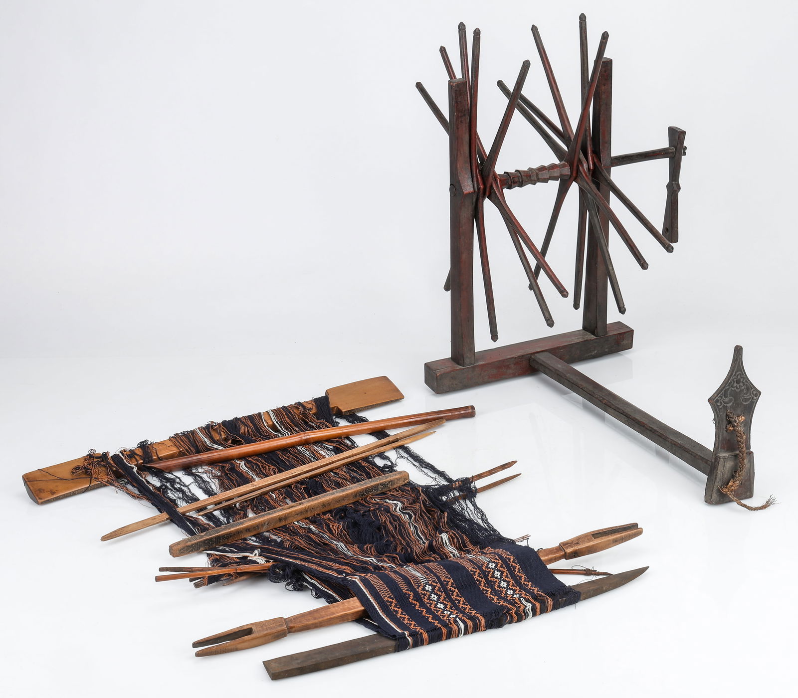 Backstrap Loom with Textile and Spinning Wheel: Backstrap Loom with Textile and Spinning Wheel. Possibly Southeast Asian origin, based on the form of the spinning wheel, though backstrap weaving has also been practiced in South America for centurie